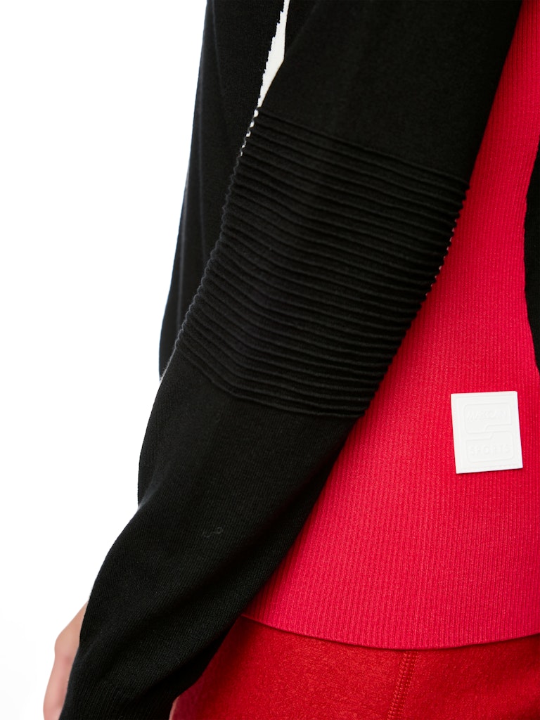 Strick Rolli in schwarz mit Details in cranberry "Rethink Together"