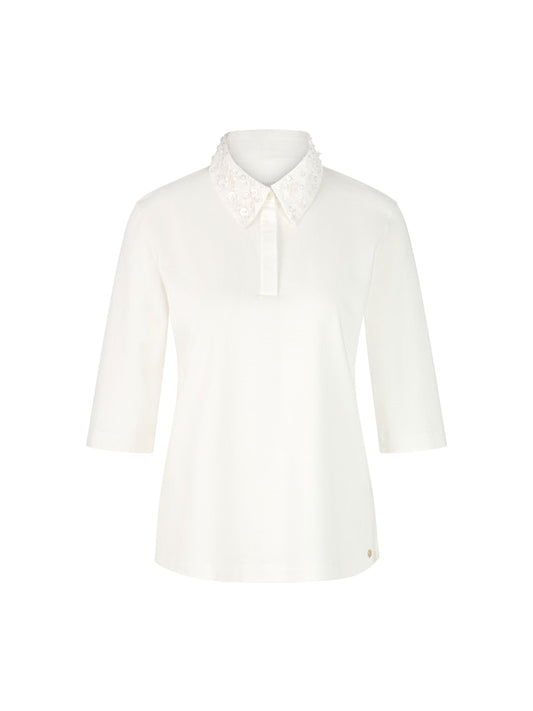 Poloshirt in creme mit Schmuckperlen